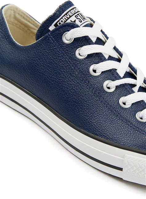 navy leather converse.